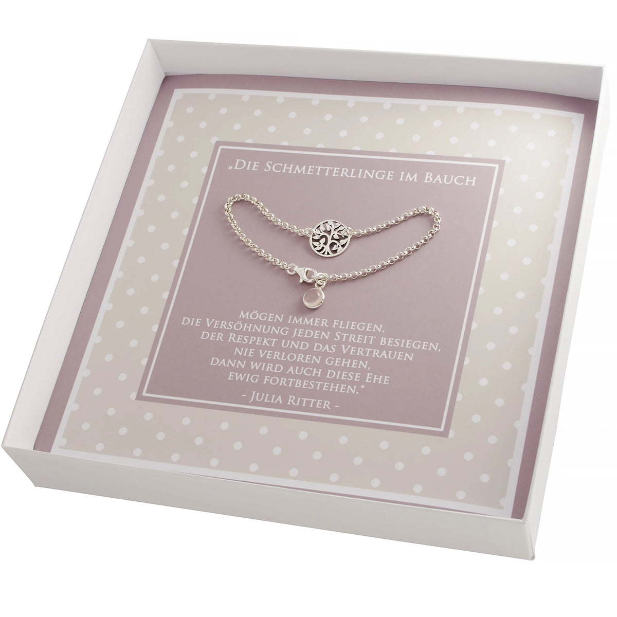 Hochzeitsarmband ‚Happy Bride‘ mit Lebensbaum und Rosenquarz in der geöffneten Geschenkbox; darunter ist ein Hochzeitsspruch abgedruckt.