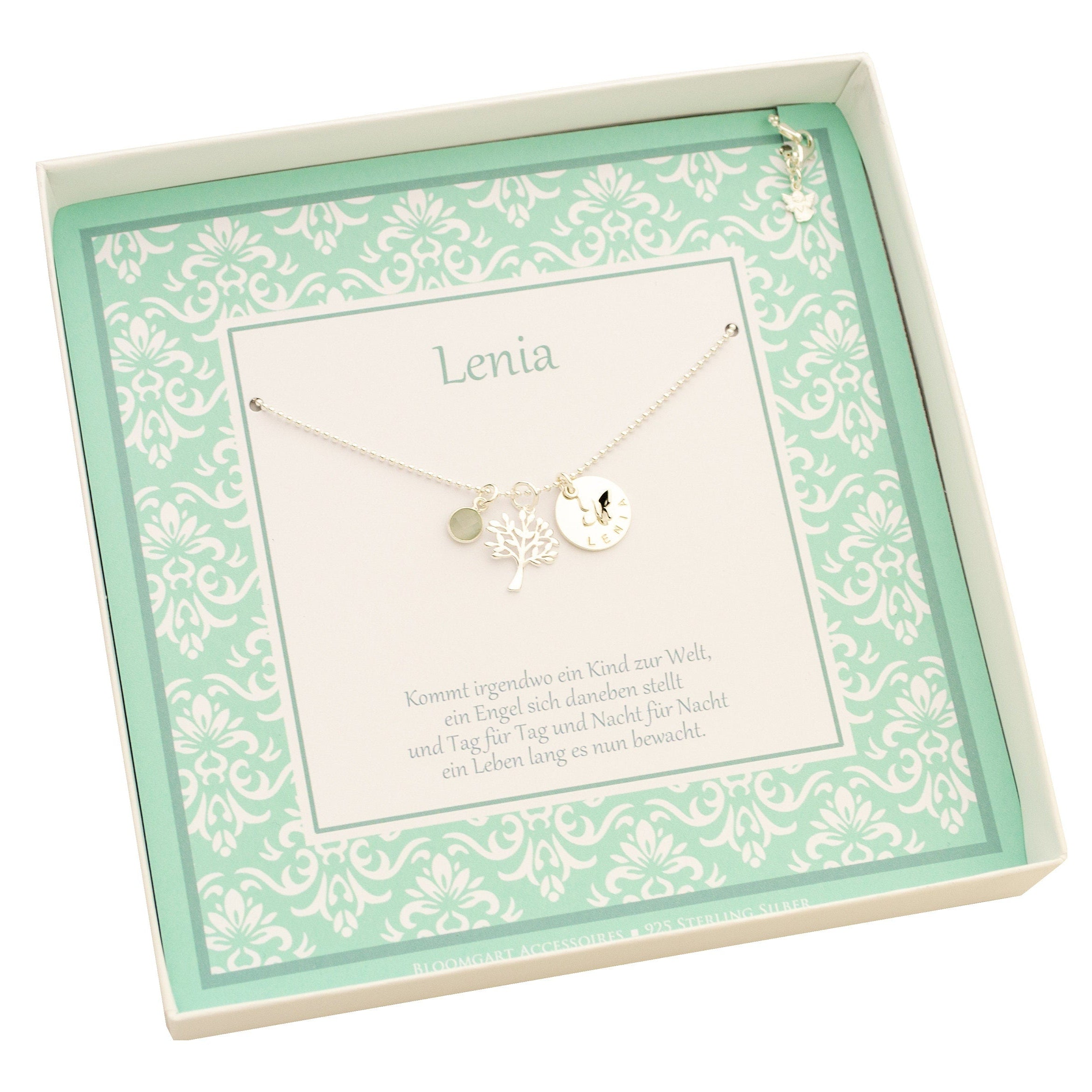 Innenansicht einer Geschenkschachtel mit mintfarbigem Ornament-Muster und Personalisierung für 'Lenia'.