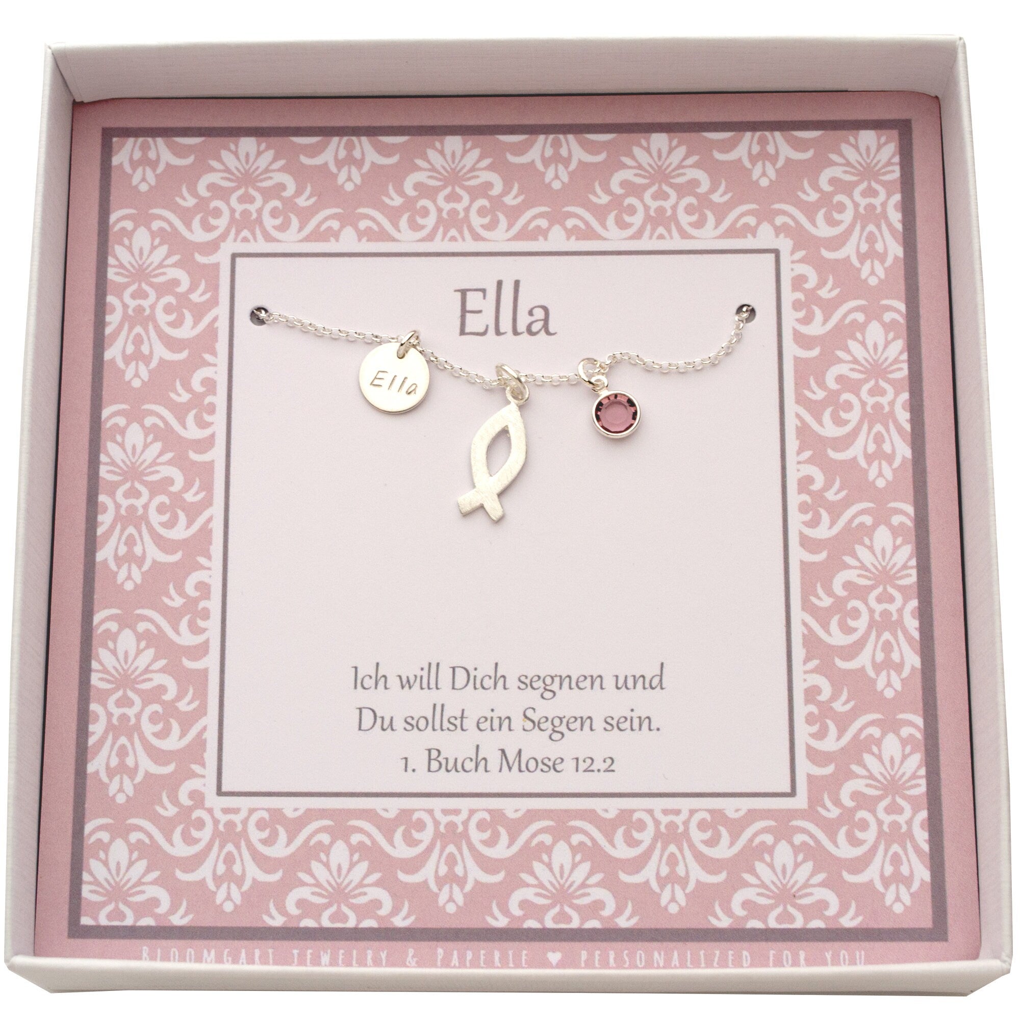 Innenansicht der Geschenkbox für Ella mit der Taufkette: Ichthys-Fisch, Gravur-Taler und Swarovski-Stein in 925 Silber.
