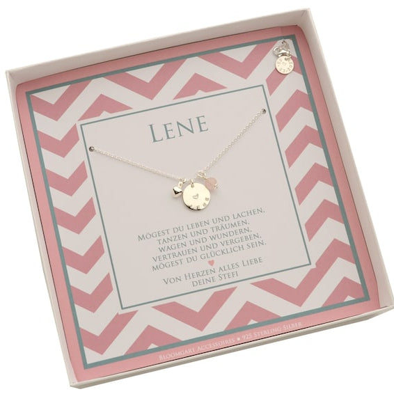 Innenansicht der rosa Geschenkbox mit Personalisierung für LENE und den Glückwünschen 'Mögest du leben und lachen, tanzen und träumen, wagen und wundern, vertrauen und vergeben, mögest du glücklich sein. Von Herzen alles Liebe, deine Steffi'