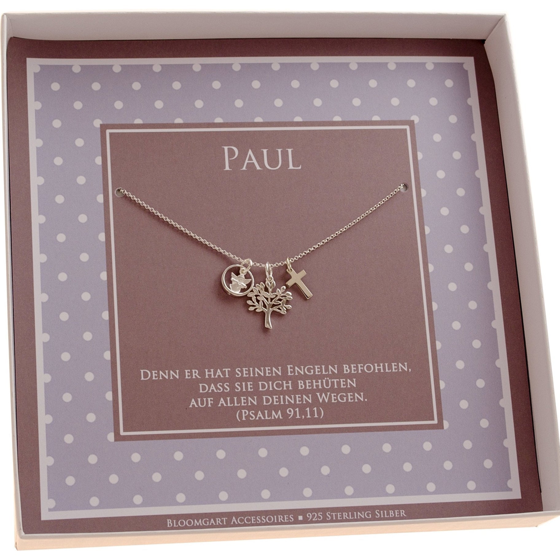 Innenansicht der Taufkette für Paul mit Engel, Taufring, Lebensbaum und Kreuz. Unterhalb der Kette ist der Taufspruch gedruckt: 'Denn er hat seinen Engeln befohlen, dass sie dich behüten auf allen deinen Wegen. (Psalm 91,11)'