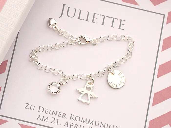 Neue Geschenkideen zur Taufe, Kommunion oder Konfirmation: personalisiertes Silberarmband mit Gravur, Schutzengel und Geburtsstein.