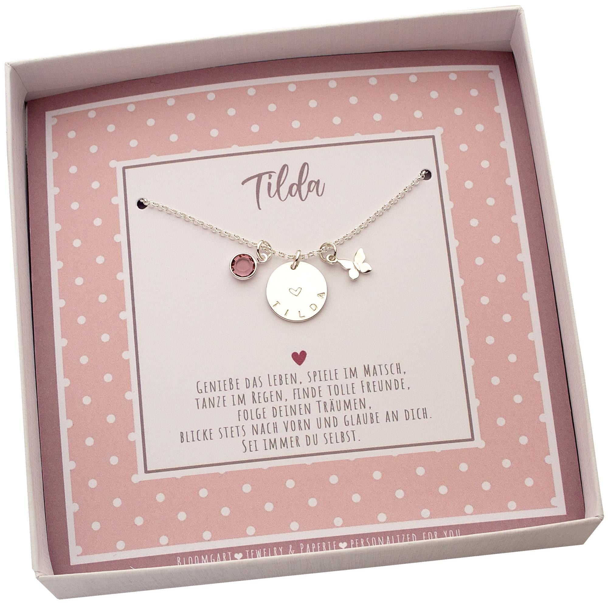 Innenansicht der Geschenkbox mit Punkte-Muster in rosa weiß und individuellem Spruch. Innenliegend ist eine Namenskette aus 925 Silber montiert.