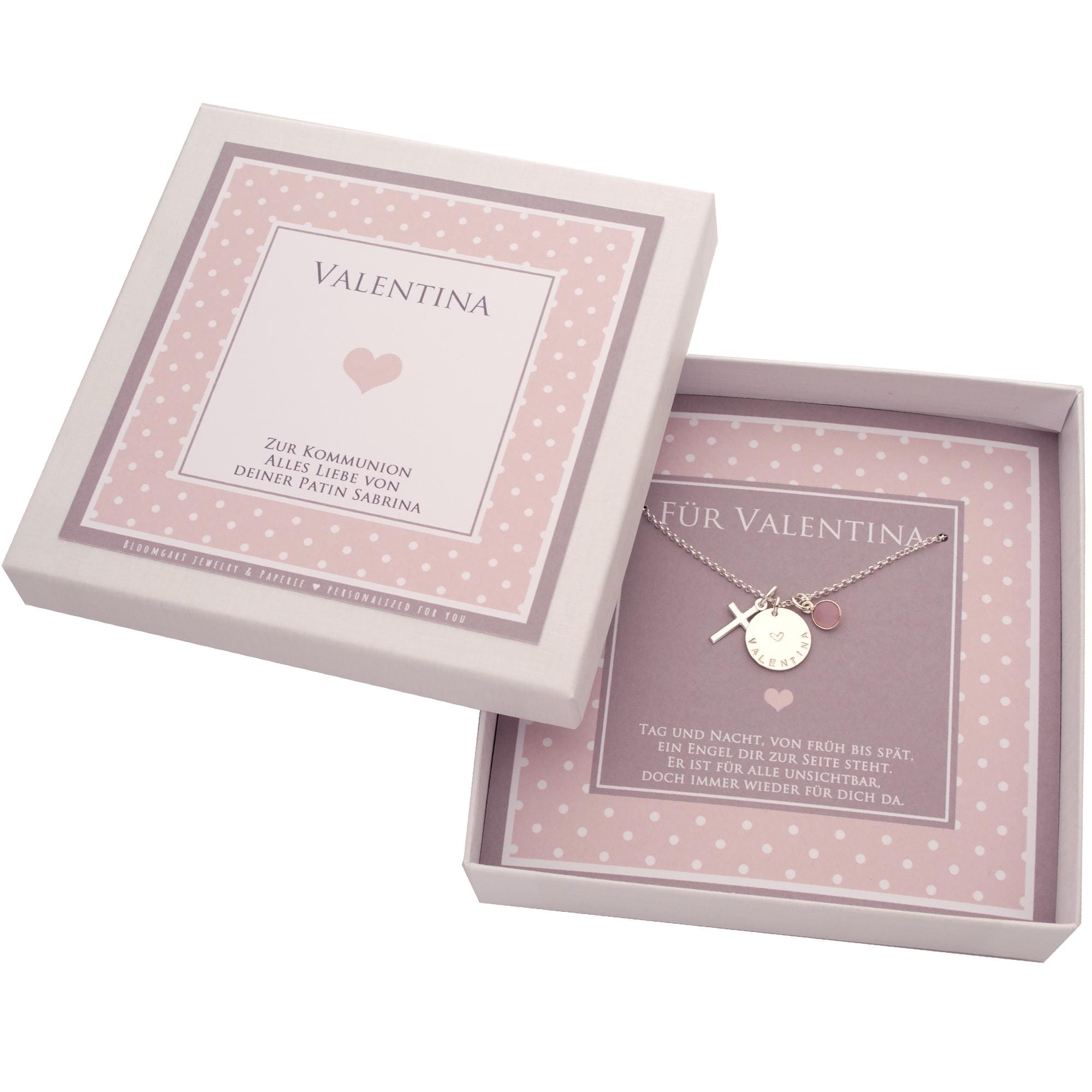 Komplettansicht der rosa-taupe gepunkteten Geschenkbox mit Personalisierung für Valentina zur Kommunion. Innen ist der Spruch 'Tag und Nacht, von früh bis spät, ein Engel dir zur Seite steht. Er ist für alle unsichtbar, doch immer wieder für dich da' gedruckt.