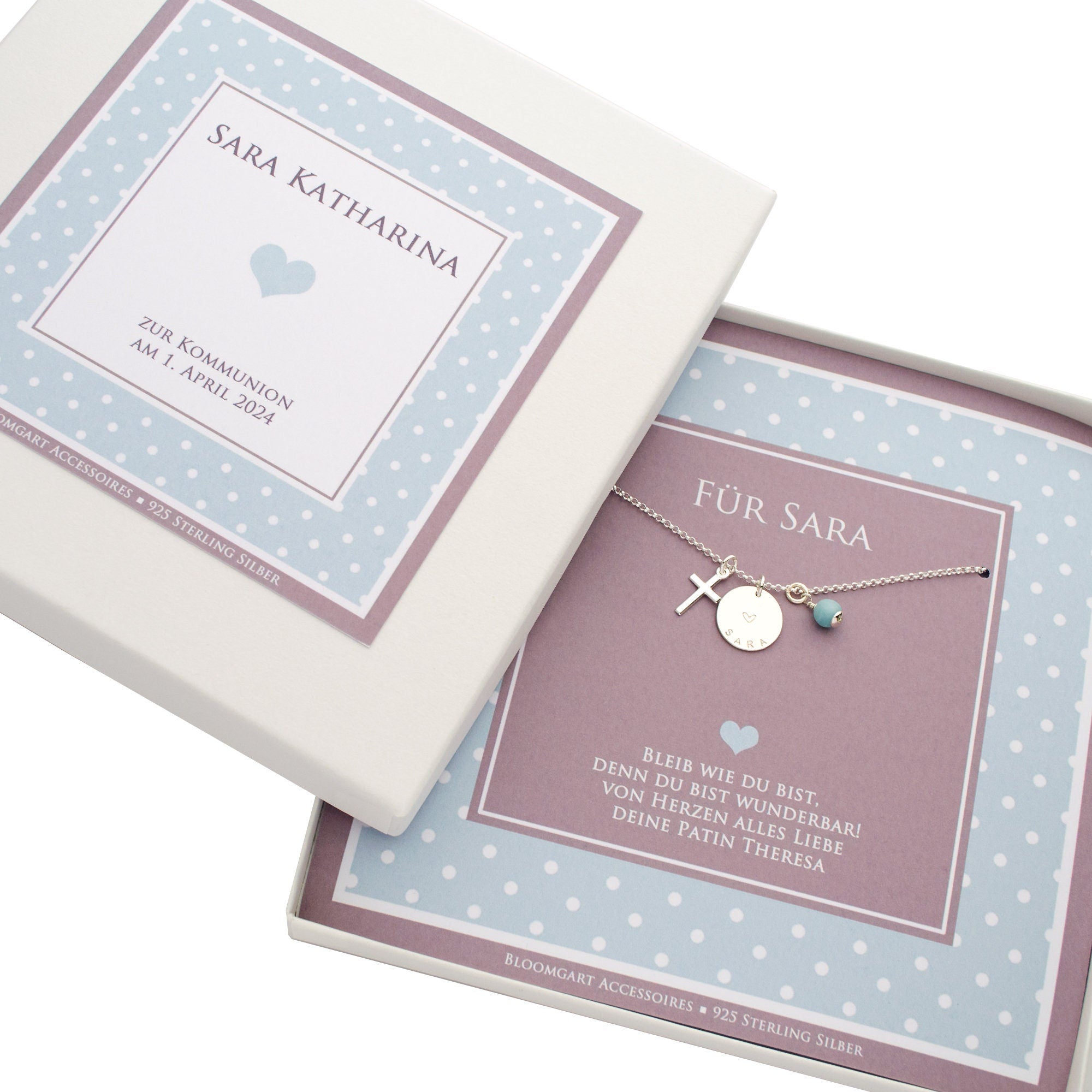 Ein personalisiertes Kommunionsgeschenk mit Silberkette und Spruch 'Bleib wie u bist, denn du bist wunderbar.'
