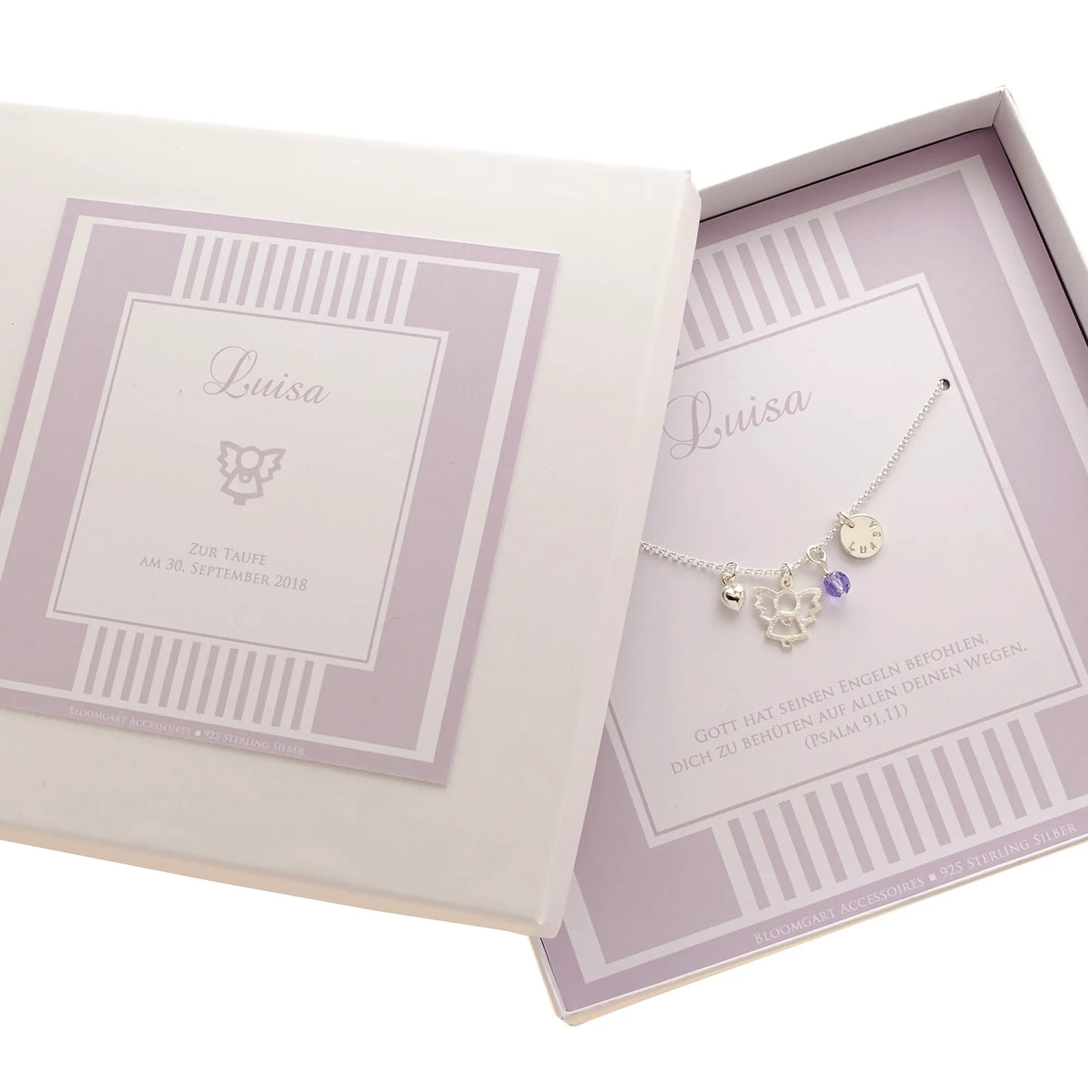 Eine personalisierte Taufkette für Mädchen als Schutzengelkette in handgefertigter Geschenkbox mit 925 Silberkette. Die Namensgravur ist von Hand gestempelt und macht die Silberkette zum Unikat.