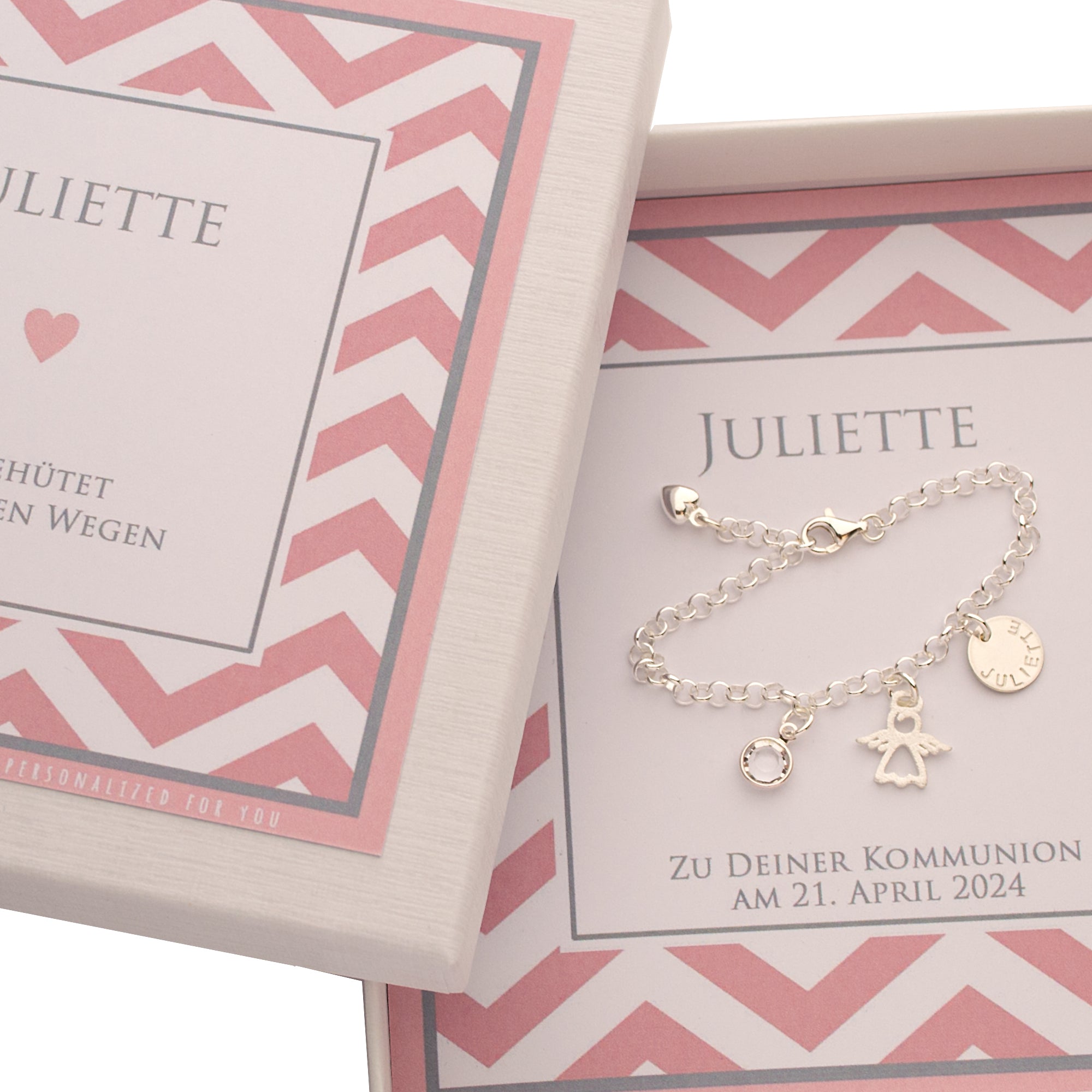 Personalisiertes Schutzengel-Armband "Juliette" aus 925 Silber mit Namensgravur und Geburtsstein, präsentiert in einer rosa Geschenkbox.