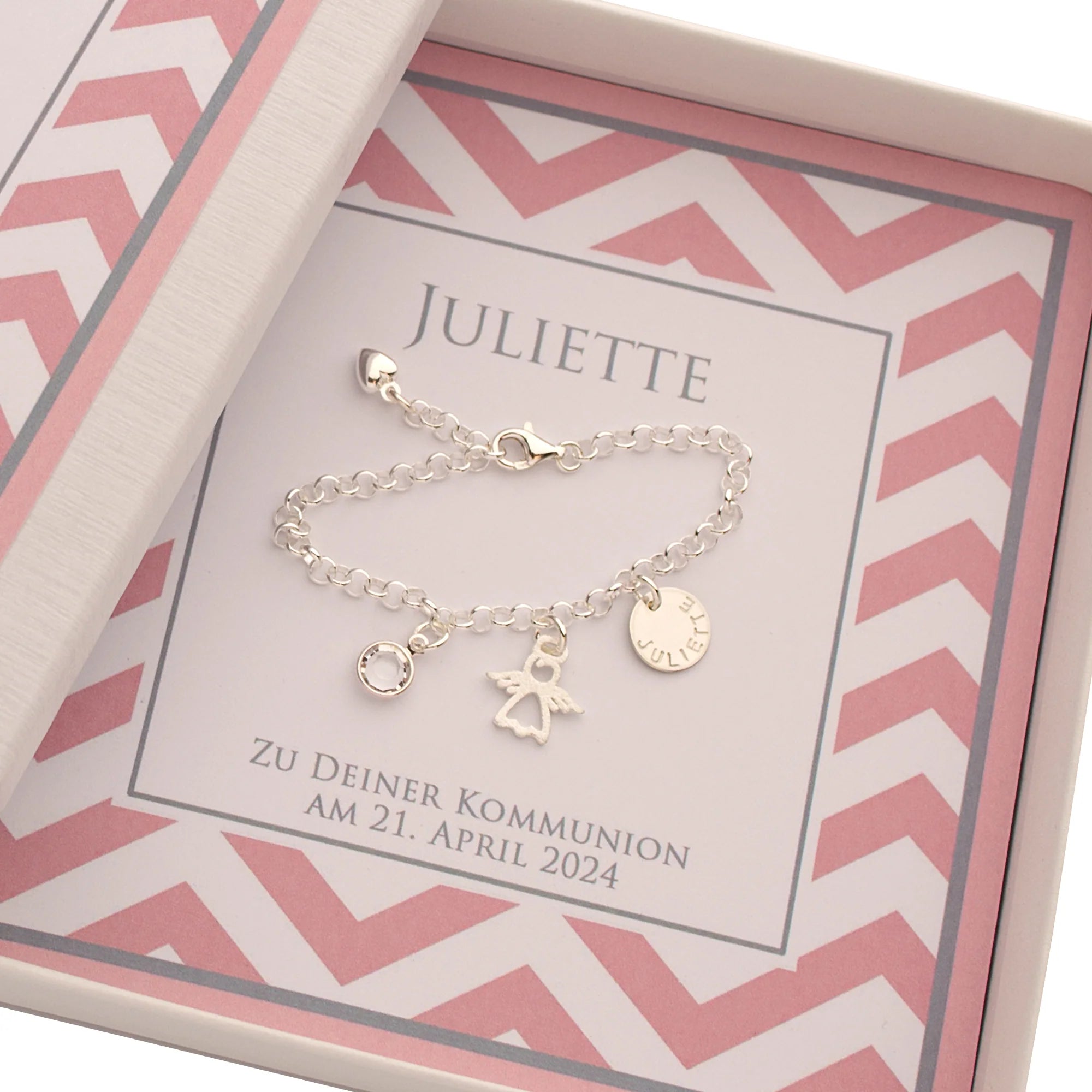 Personalisiertes Schutzengel-Armband "Juliette" aus 925 Silber mit Namensgravur und Rosenquarz, präsentiert in einer rosa Geschenkbox.