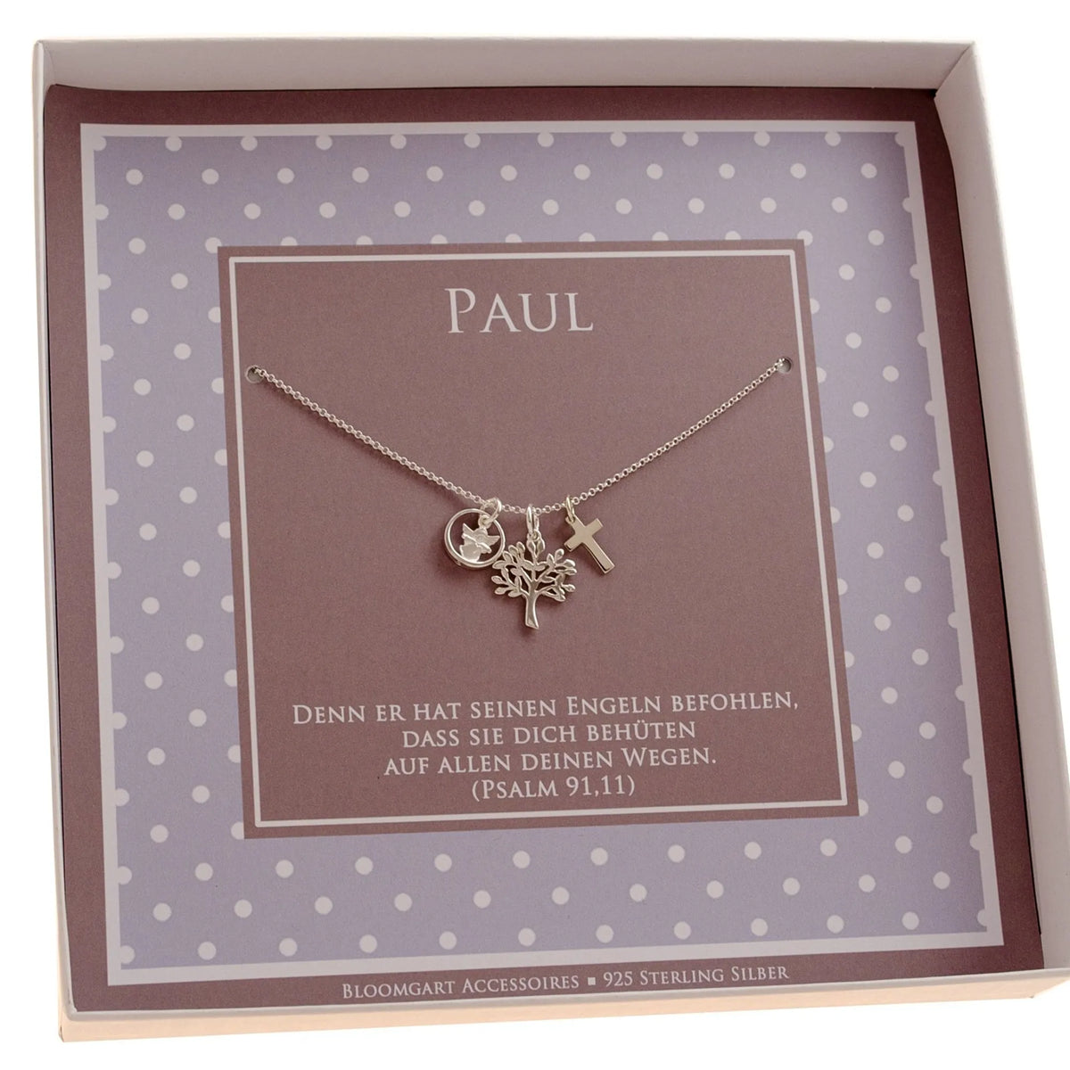 Innenansicht der Taufkette für 'Paul' mit Engel, Taufring, Lebensbaum und Kreuz. Unterhalb der Kette ist der Taufspruch gedruckt: 'Denn er hat seinen Engeln befohlen, dass sie dich behüten auf allen deinen Wegen. (Psalm 91,11)'