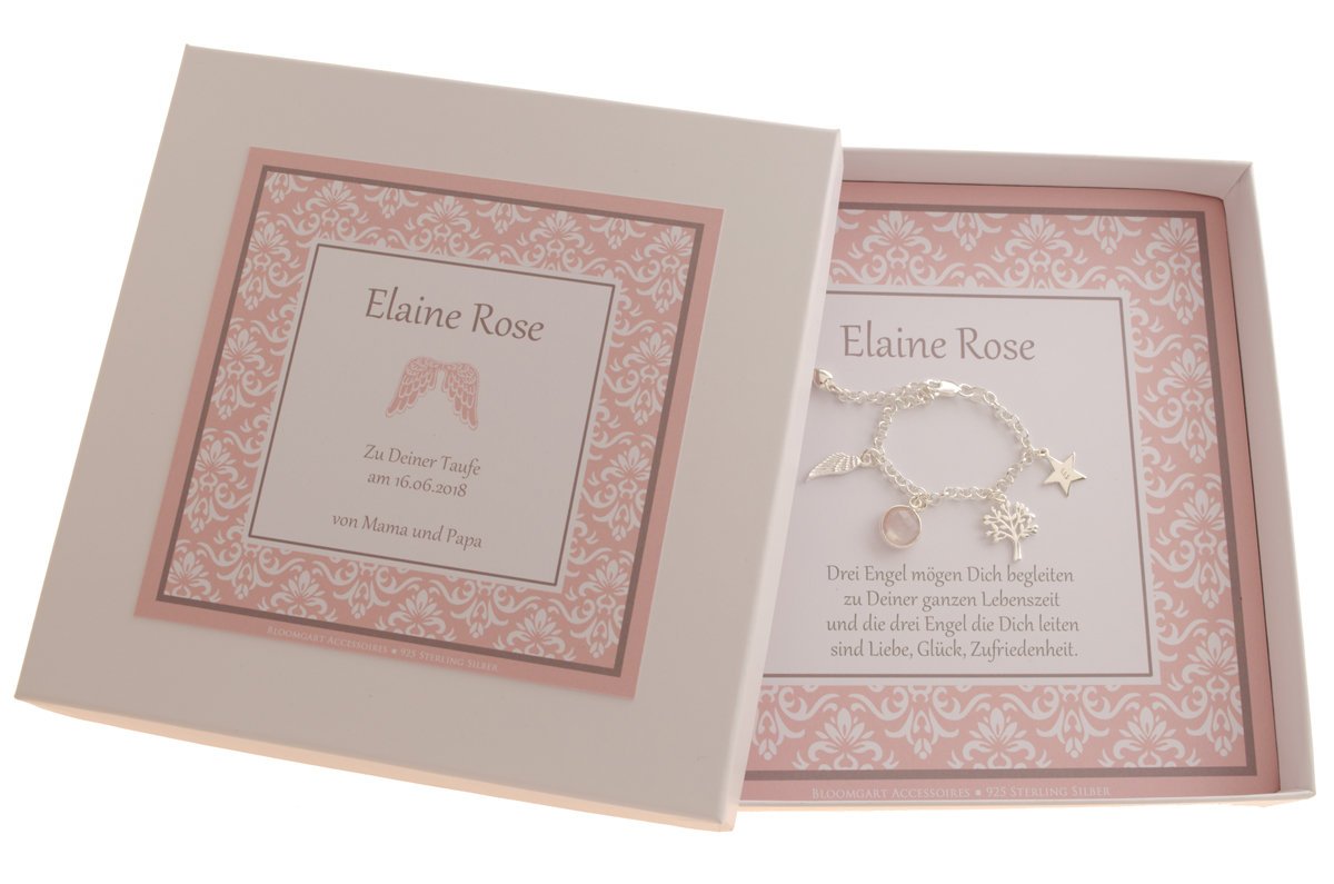 Gesamtansicht der personalisierten Geschenkbox in rosa-grau-weiß mit Flügel auf dem Cover und Silberarmband mit Flügel, Rosenqarz, Baum und Initial-Stern innenliegend.