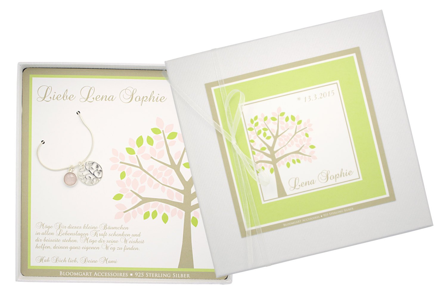 Elegante Silberkette mit Baum des Lebens und Edelstein, hier ein runder Rosenquarz in einer fröhlichen personalisierten Geschenkbox. Das Design des Geschenkkartons ist geprägt von rosa und grün Tönen und mit einem stilisierten Baum versehen.